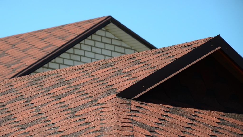 Details of new residential asphalt shingle roof in excellent condition.